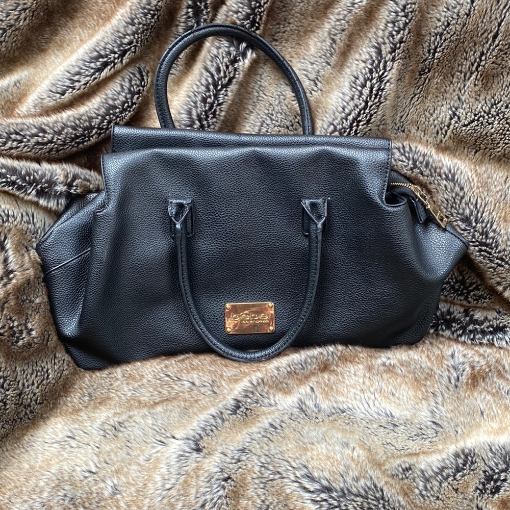 Bebe, Los Angeles bucket bag like new can be used as a Crossbody